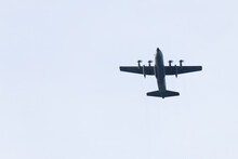 silhouette of plane Lockheed C-130 Hercules, an American four-engine turboprop military transport aircraft 