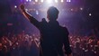 Back view portrait of a male singer in action raising his hand on stage facing a cheering audience, generative AI