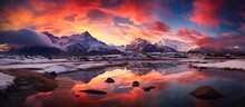 As The Vibrant Sunset Painted The Sky, The Calm Lake Water Mirrored The Awe-inspiring Reflections Of The Dramatic Clouds, Snow-capped Mountains Adding A Touch Of Grandeur To The Serene Landscape.