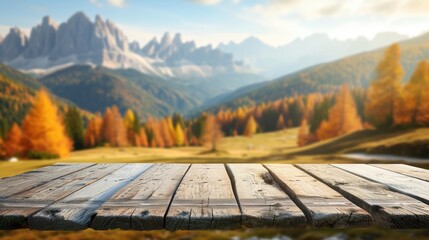 wooden table top on blurred background of autumn color landscape in dolomites - for display your pro