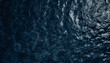© LouLou - Transparent dark blue clear water surface texture with ripples and splashes