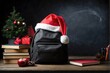 Santa Claus hat on student bag, black board background 