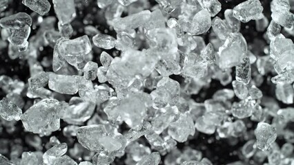 Fototapete - Super slow motion of rotating ice cubes, top view shot. Filmed on high speed cinema camera, 1000 fps, placed on high speed cine bot, following the object. Speed ramp effect. 