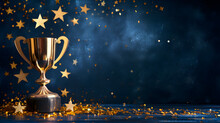 Golden Trophy Cup With Stars Isolated On Dark Blue Background With Copy Space For Text