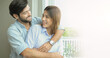 © Montri - Portrait of couple posing photo shooting. Portrait of young couple smiling. two friends family man woman in casual clothes boyfriend. Valentine's Day.