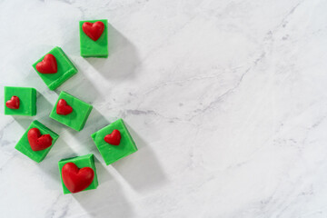 Sticker - Green fudge with red hearts