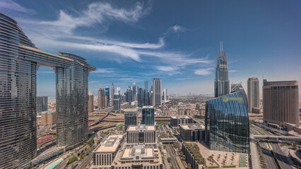 Wall Mural - Futuristic Dubai Downtown and financial district skyline aerial all day timelapse.