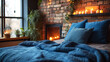 Bed with a blue pillow and coverlet near a fireplace. Loft interior design of a modern bedroom with a brick wall.