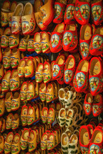 Dutch Wooden Shoes Or Wooden Clogs, Famous Symbol Of Netherlands, Hanged In The Shop