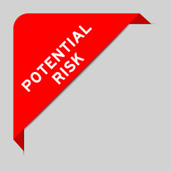 Sticker - Red color of corner label banner with word potential risk on gray background