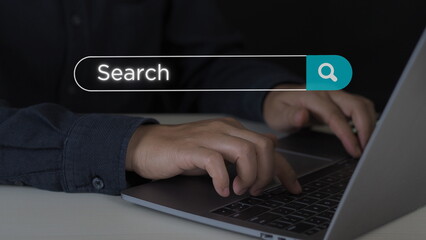 Wall Mural - data search technology search engine optimization. man's hands are using a computer notebook to sear