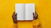 Elegant Hands Of An African Woman Hold An Open Notebook With Blank Pages. 