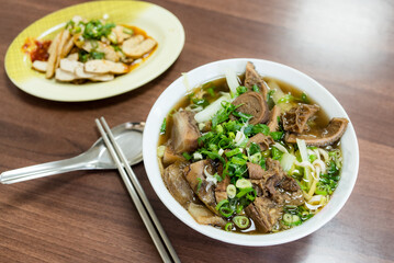 Canvas Print - Braised beef noodle soup in restaurant