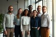 © Jelena - Group portrait of smiling business people