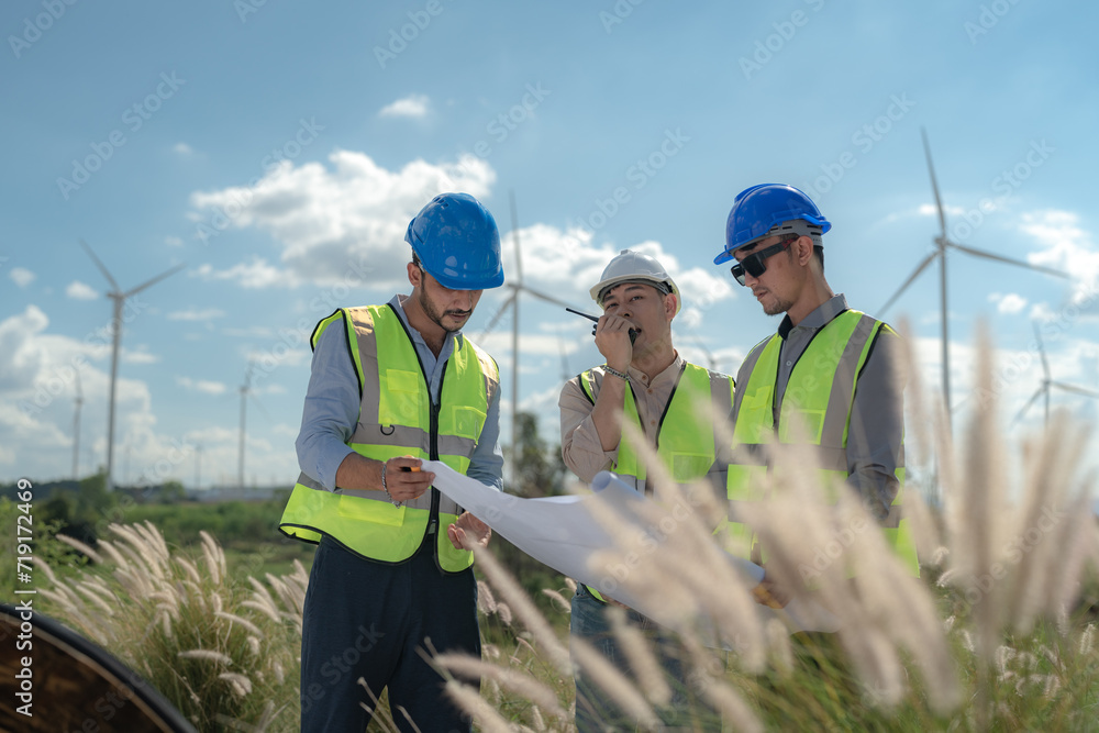 Asian engineer working in fieldwork outdoor. Workers check and inspect ...