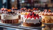 © ds17 - Delicious cakes with cream on display in a bakery close-up