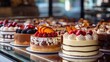 © dwoow - Delicious cakes with cream on display in a bakery close-up