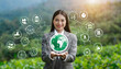 Carbon credit concept with icon on green globe reducing carbon concept, Businesswomen show icon Carbon footprint reduction, Zero net, Carbon credit to limit global warming, Bio Circular Green Economy