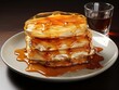 Pancake with syrup on a white plate