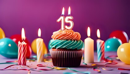 Wall Mural - Birthday cupcake with burning lit candle with number 15. Number fifteen for fifteen years or fifteenth anniversary.