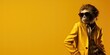Baboon in yellow jacket and sunglasses on yellow background.