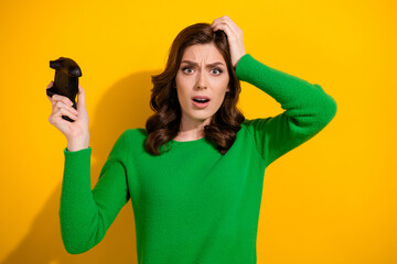 Sticker - Photo of upset woman addicted gamer wear trendy green clothes failed game over isolated on yellow color background