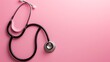 © Orxan - Stethoscope on pink background and copy space