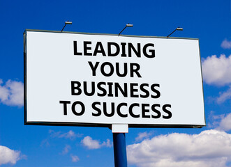 Wall Mural - Leading your business to success symbol. Concept words Leading your business to success on beautiful billboard. Beautiful blue sky background. Leading your business to success concept. Copy space
