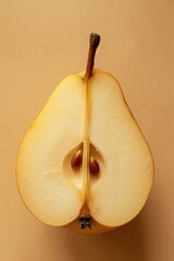 Poster - A picture of an apple that has been cut in half, placed on a table. Suitable for various uses