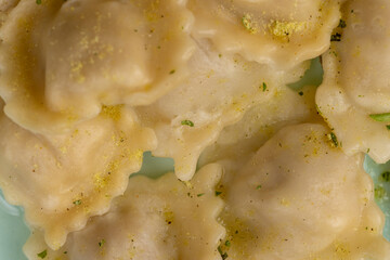 Wall Mural - small dumplings with wheat flour and pieces of meat