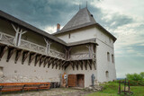 Fototapeta Konie - Medieval Halych Castle under stormy sky in Ukraine.