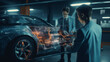 Professional man Engineers interacts with Black Holographic 3D Concept Car wearing Augmented Reality inside High-tech Industrial Facility. Car Chassis Prototype. The Future of Hololens Tech