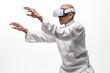 © gankevstock - man in a white uniform practices martial arts movements while immersed in a virtual reality environment, his focus unwavering