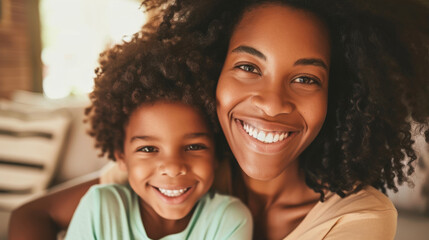 Poster - smiling woman and a young girl with curly hair