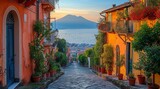 Fototapeta  - Amalfi coast look-like landscape, Italian town on the sea, terraced houses decorated with flowers. Mediterranean travel concept