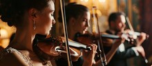 Two Musicians Playing Violins On A Wedding Reception. Copy Space Image. Place For Adding Text