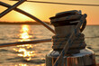 Winch on a sailboat during the beautiful sunset golden hour