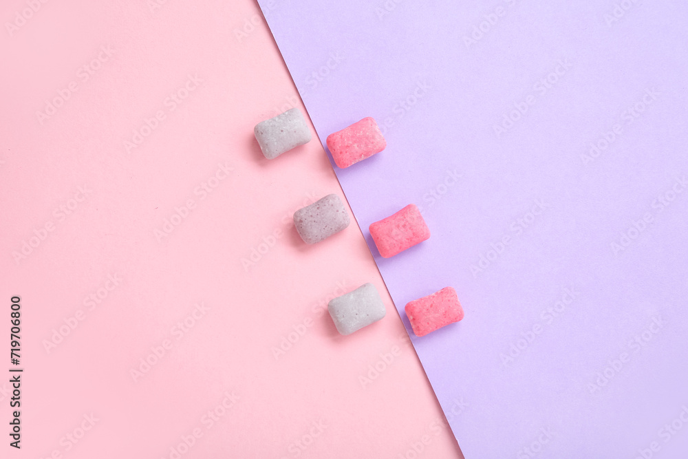 Chewing gums on color background
