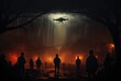 Silhouetted against the dark night sky, a group of people watches in awe as a firefighter helicopter flies over, cutting through the thick fog and casting an otherworldly glow upon the outdoor scene