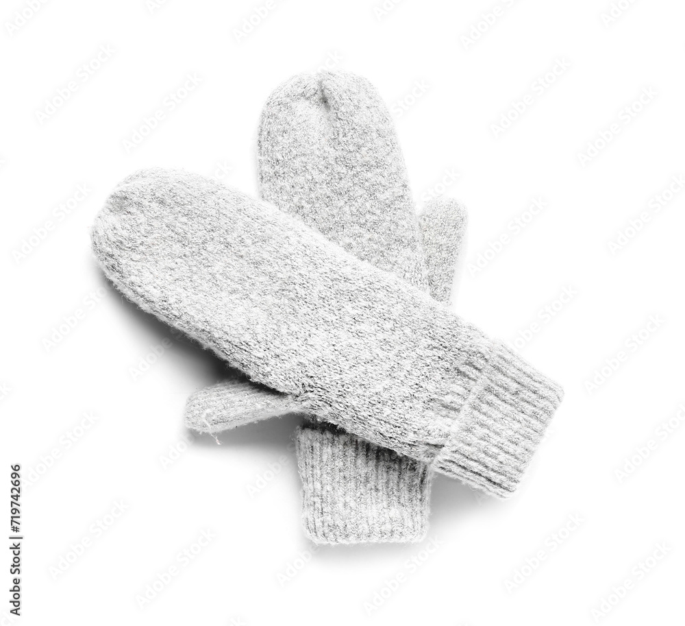Pair of warm knitted mittens on white background