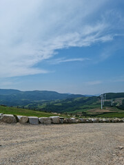 Canvas Print - It is a landscape of a gravel dirt road and a sheep ranch.