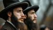 © EmmaStock - Two Jewish male wearing Yermolka tanking