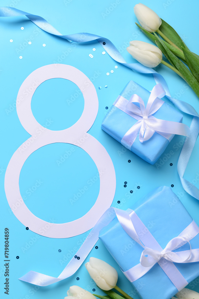Figure 8 with gift boxes and beautiful tulips on blue background. International Women's Day