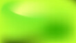 © antek - Bright neon greens and yellows swirl soft and warm abstract background or wallpaper.