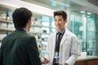 © CStock - Pharmaceutical sales representative talking with doctor in medical building.