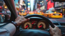 Closeup Of A Taxi Drivers Hands Gripping The Wheel As They Navigate The Crowded City Streets.