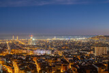 Fototapeta Londyn - The skyline of Barcelona in Spain at night