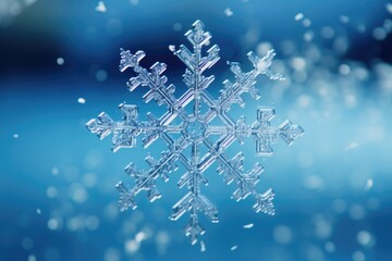 Sticker - A close-up view of a snowflake on a vibrant blue background. Perfect for winter-themed designs and holiday projects