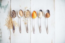 Spoons Of Various Unprocessed Whole Grains