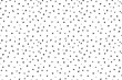 Dash pattern on white background. Wrapping paper with small black dots painted with a brush. Seamless simple minimal ornament. Abstract geometric grunge vector texture painted by ink